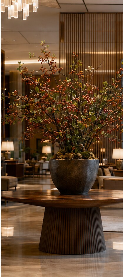 Large artificial botanical arrangement in a luxury commercial interior